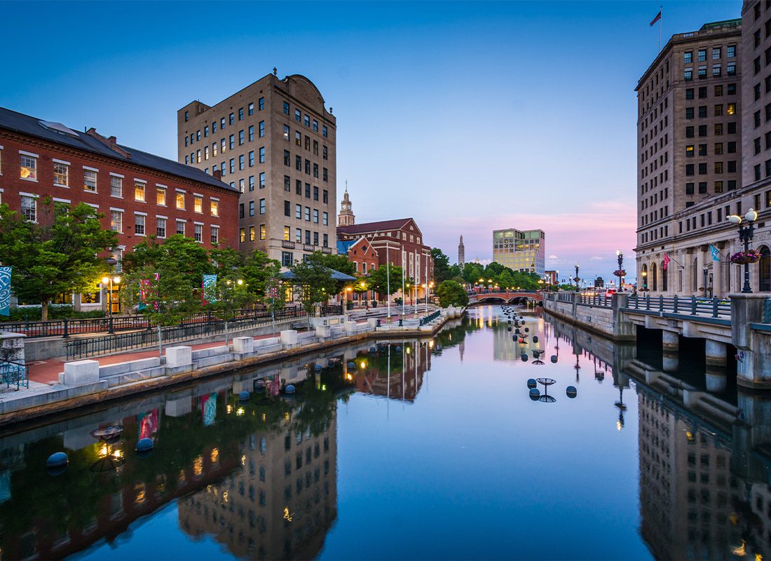 Contact - Buildings Along the Providence River at Twilight in Downtown Rhode Island